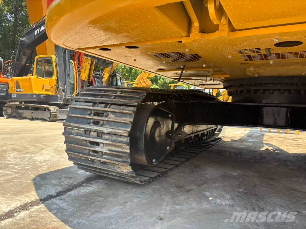 CAT 323 Bagri goseničarji