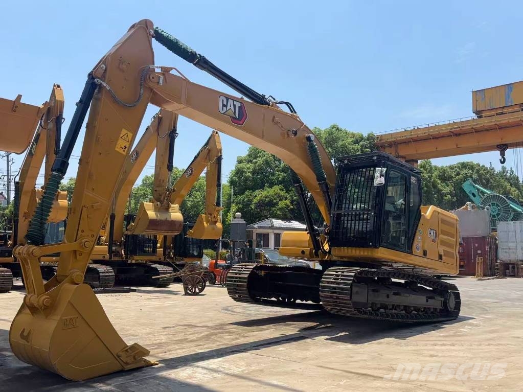 CAT 323 Bagri goseničarji