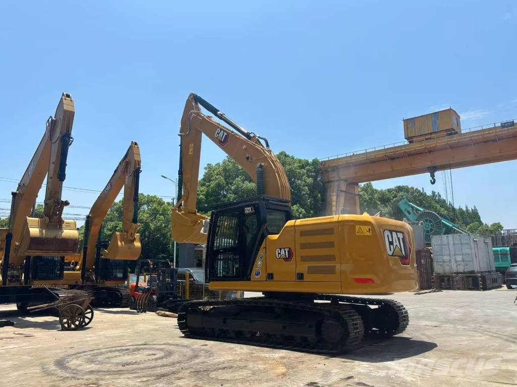 CAT 323 Bagri goseničarji