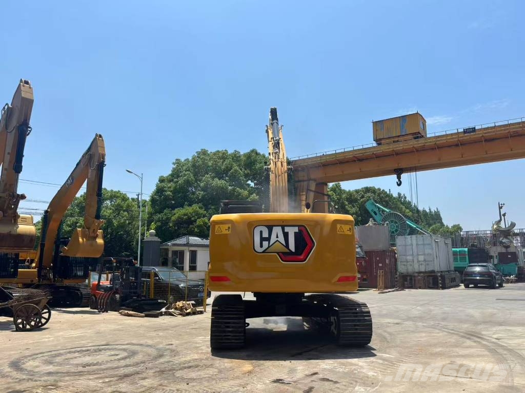 CAT 323 Bagri goseničarji