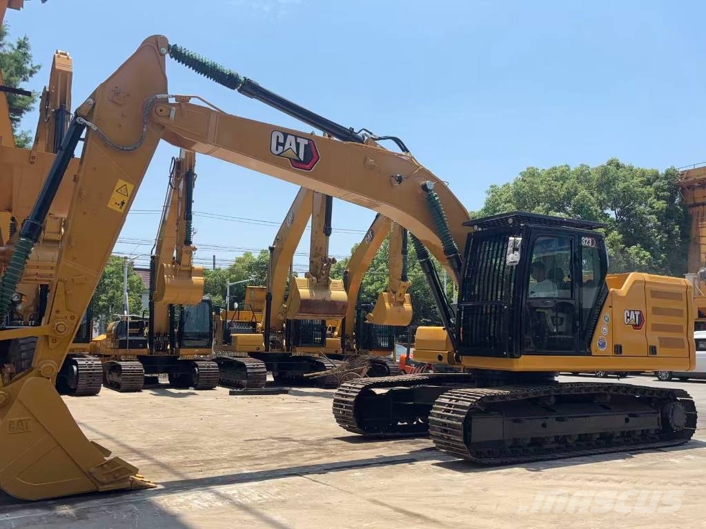 CAT 323 Bagri goseničarji