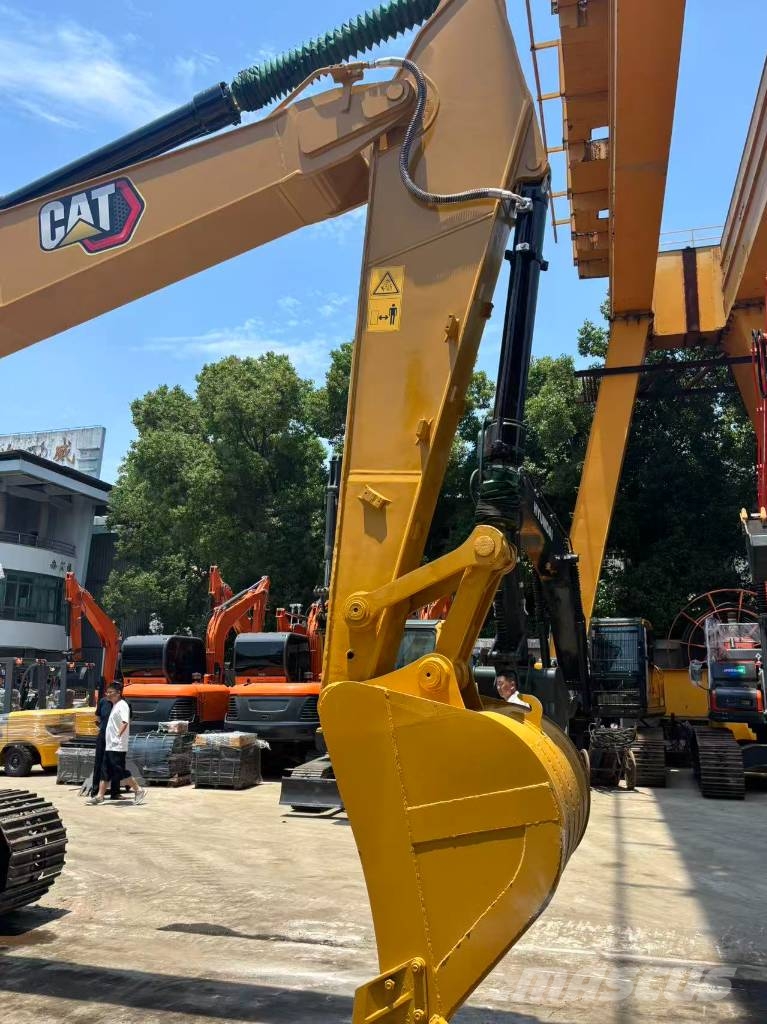 CAT 323 Bagri goseničarji