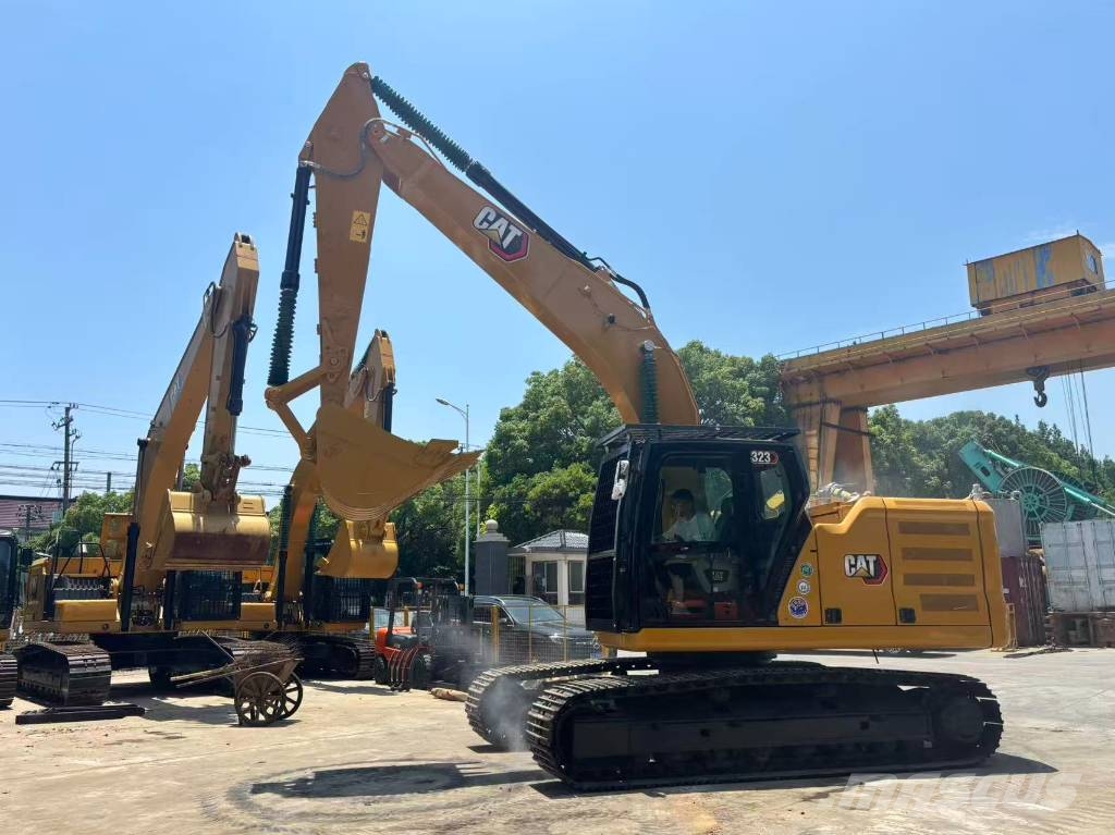 CAT 323 Bagri goseničarji
