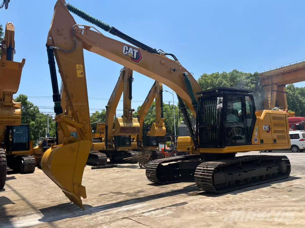 CAT 323 Bagri goseničarji