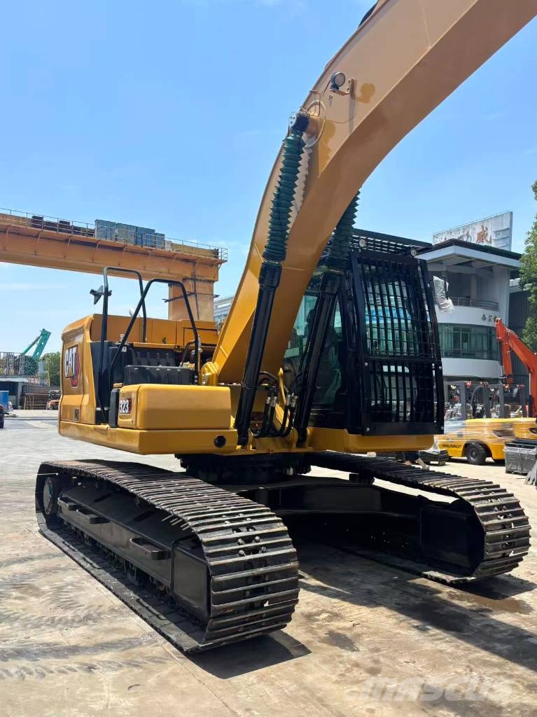 CAT 323 Bagri goseničarji