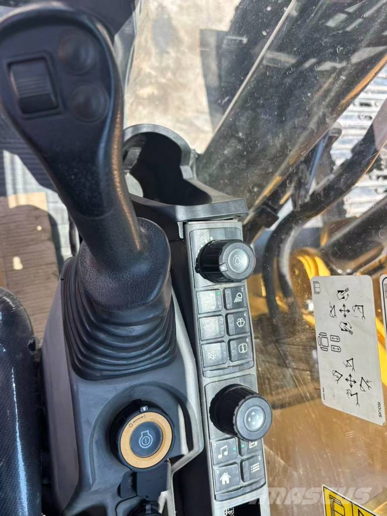 CAT 323 Bagri goseničarji