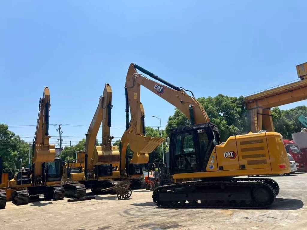 CAT 323 Bagri goseničarji