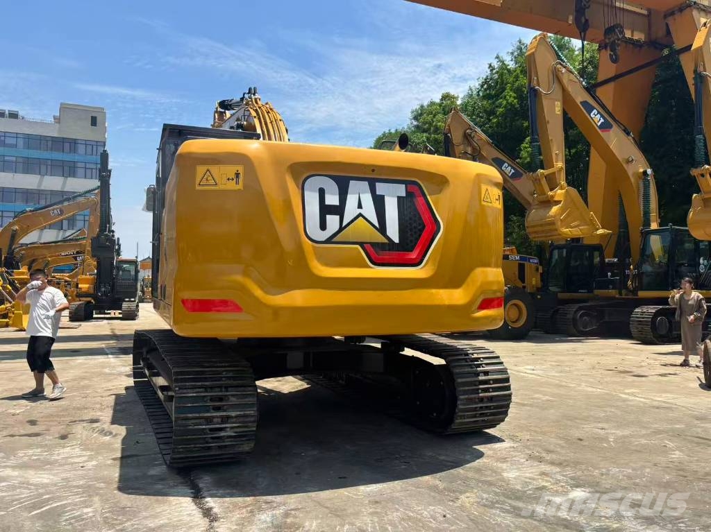 CAT 323 Bagri goseničarji
