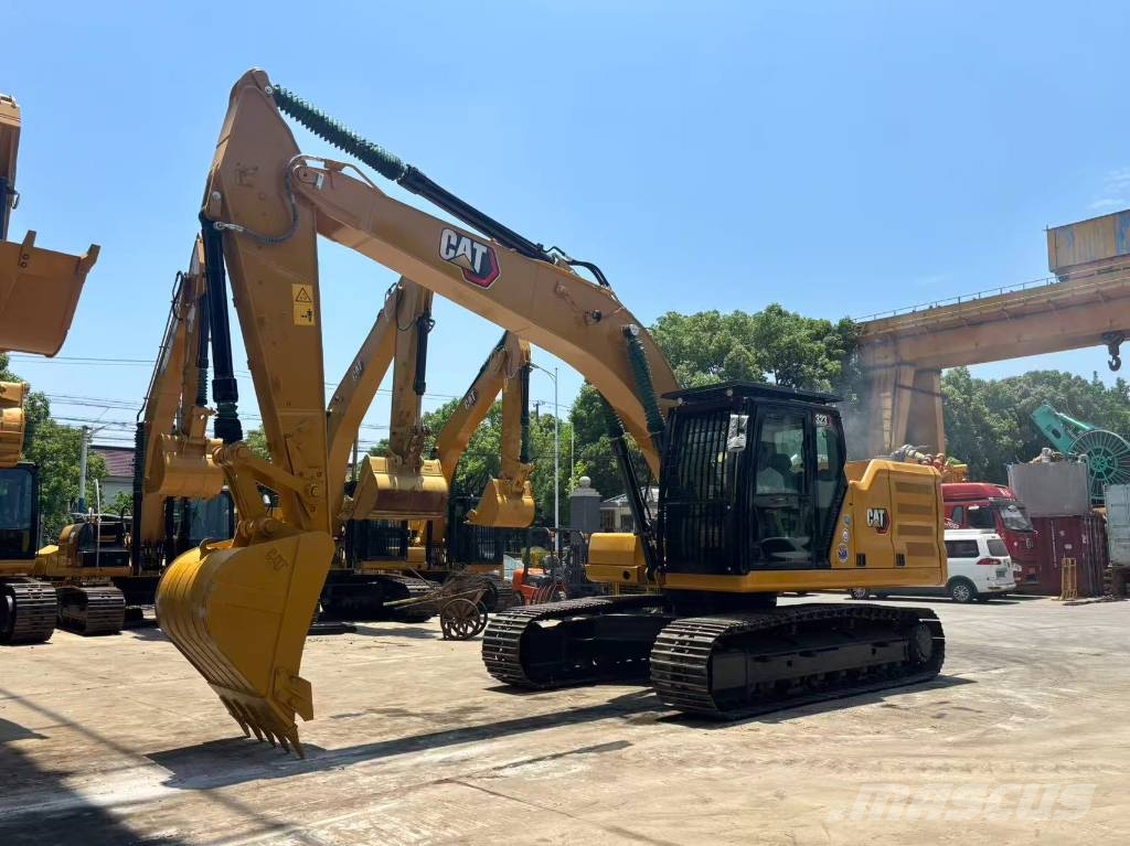 CAT 323 Bagri goseničarji
