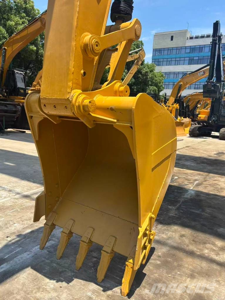 CAT 323 Bagri goseničarji