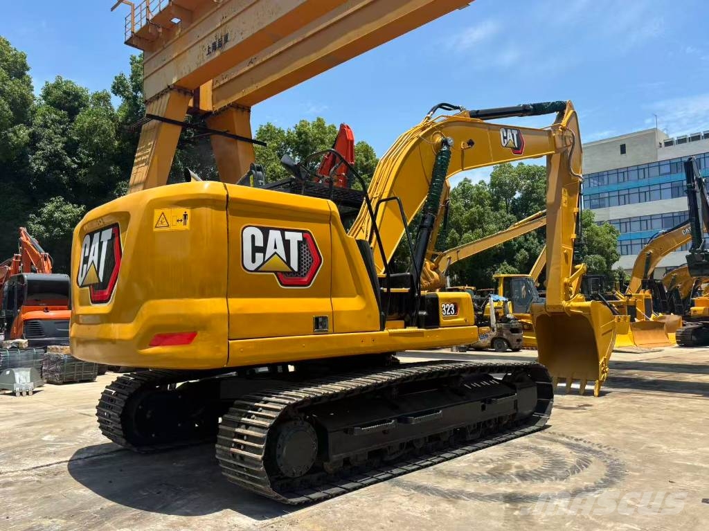 CAT 323 Bagri goseničarji