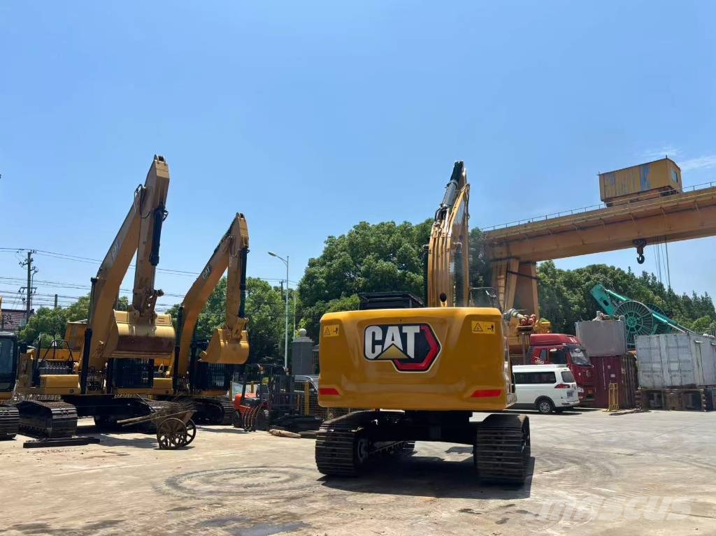 CAT 323 Bagri goseničarji