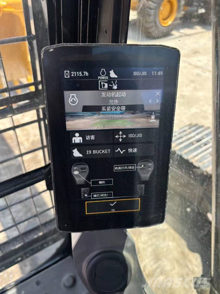 CAT 323 Bagri goseničarji