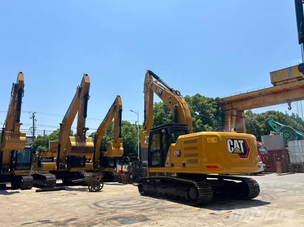 CAT 323 Bagri goseničarji