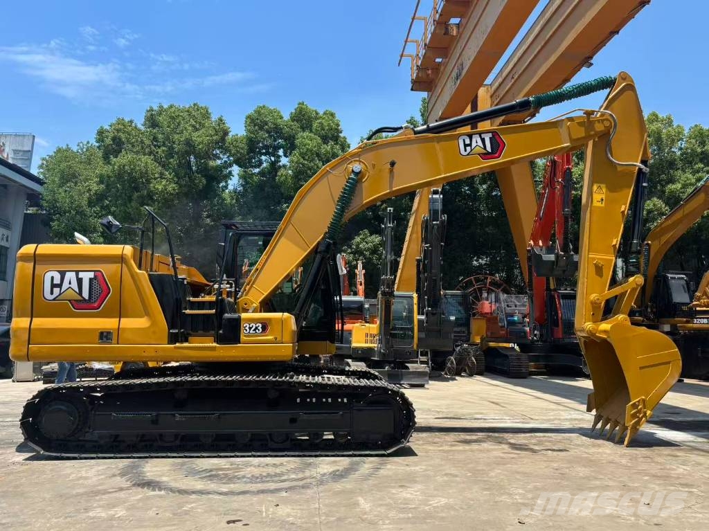 CAT 323 Bagri goseničarji