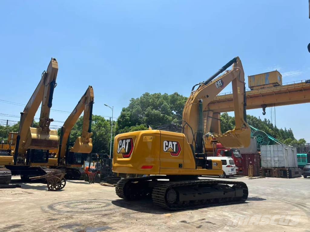 CAT 323 Bagri goseničarji