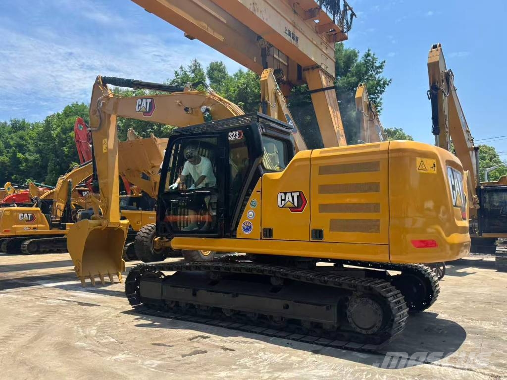 CAT 323 Bagri goseničarji