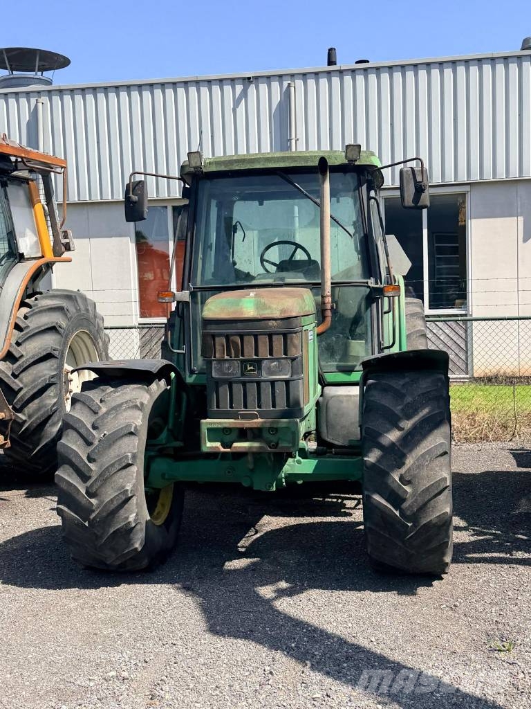 John Deere 6210    met werk Traktorit