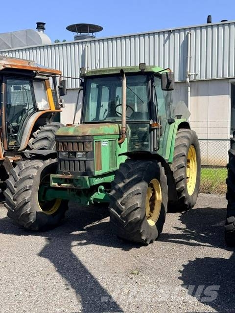 John Deere 6210    met werk Traktorit