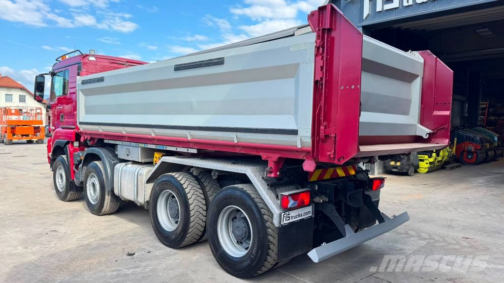 MAN TGA 35.500 8X4 SCHWARZMUELLER tipper - bordmatic Bañeras basculantes usadas
