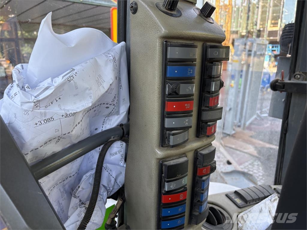 Lännen 8600E Sensodrive Koparko-ładowarki
