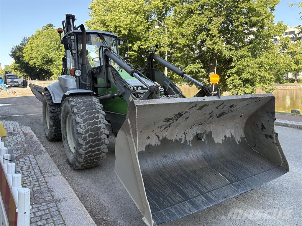 Lännen 8600E Sensodrive Koparko-ładowarki