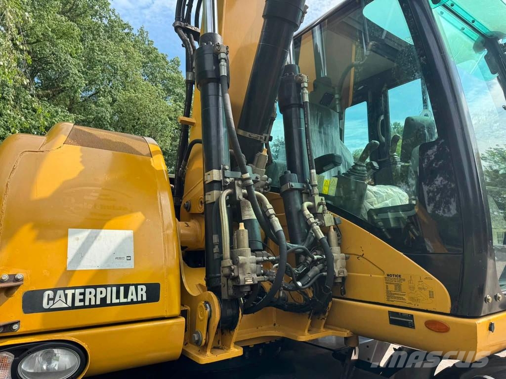 CAT M313D Mobiele kraan CW30 Ratiniai ekskavatoriai