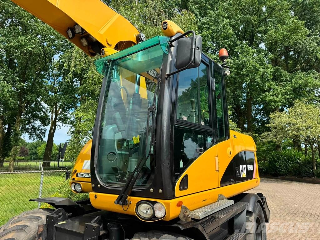 CAT M313D Mobiele kraan CW30 Ratiniai ekskavatoriai