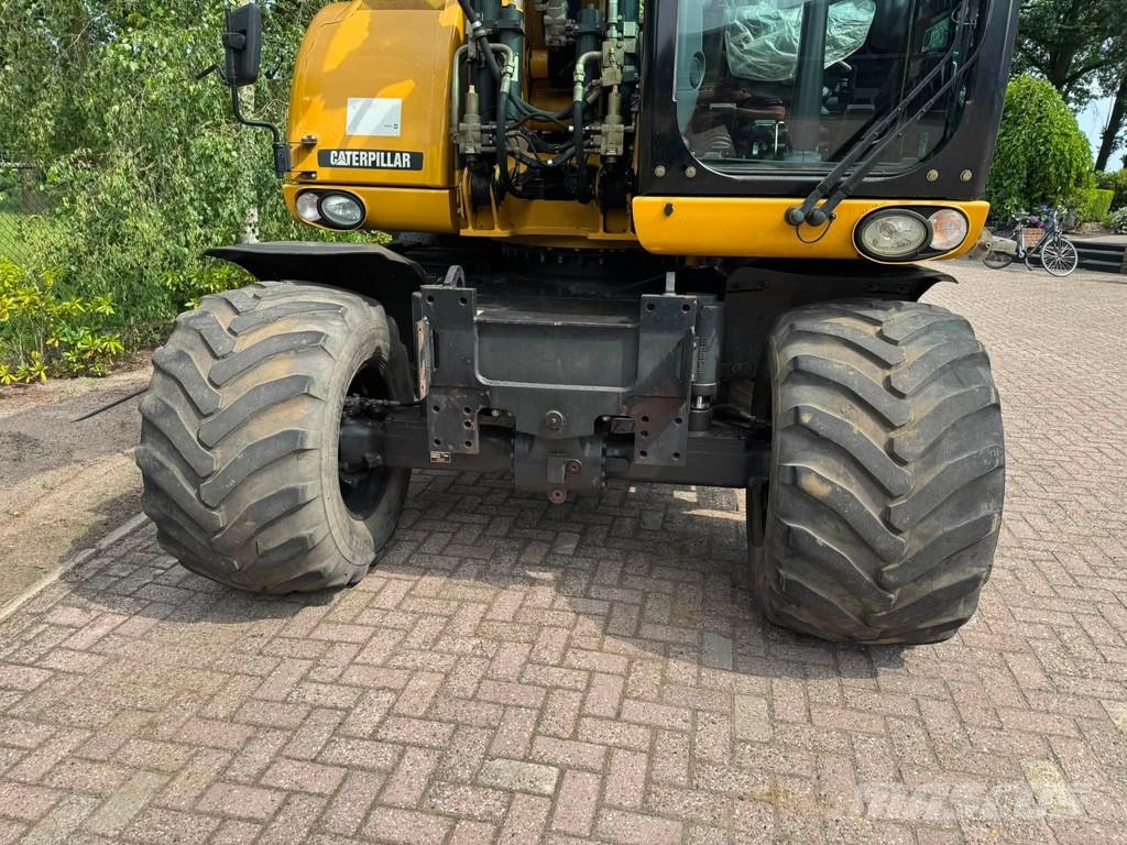 CAT M313D Mobiele kraan CW30 Ratiniai ekskavatoriai