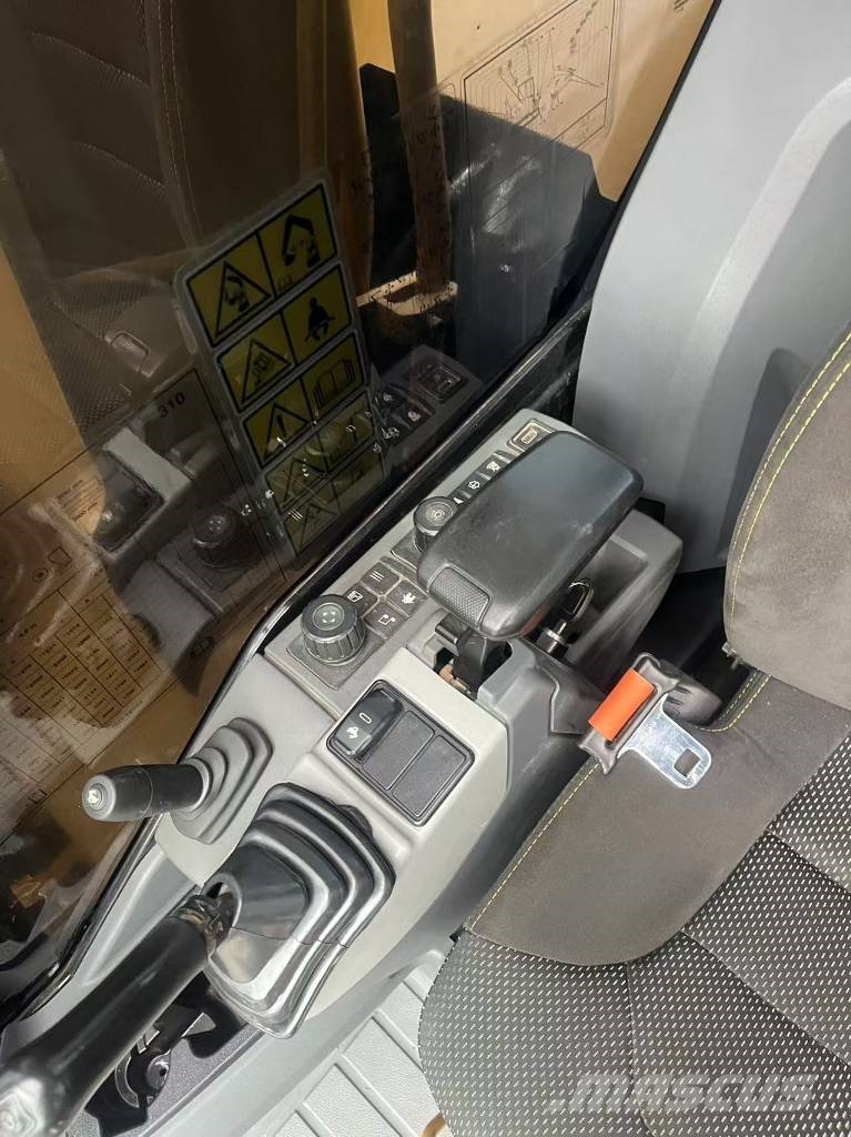 CAT 310 Гусеничні екскаватори