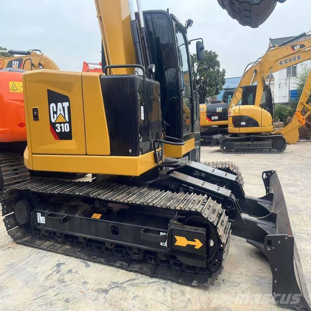 CAT 310 Гусеничні екскаватори