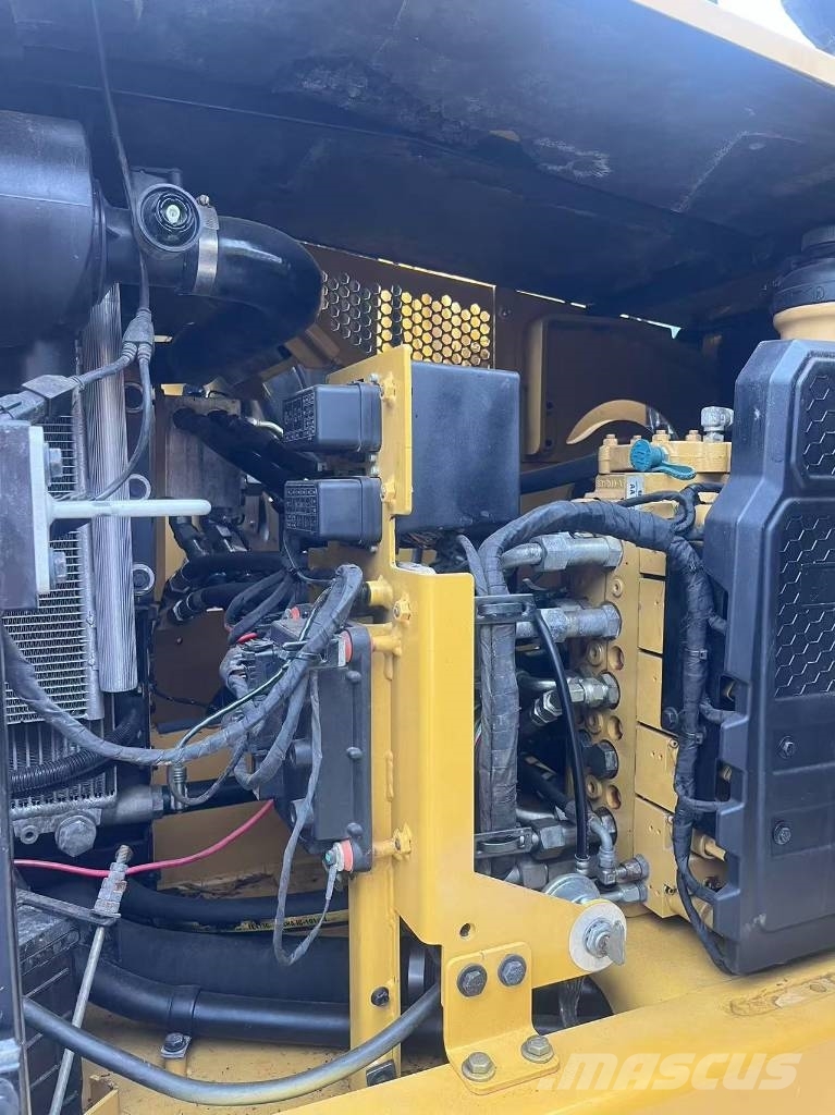 CAT 310 Гусеничні екскаватори