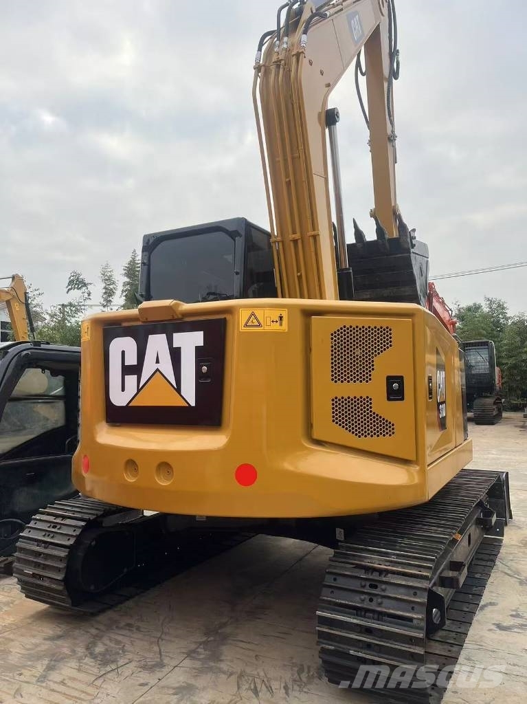 CAT 310 Гусеничні екскаватори