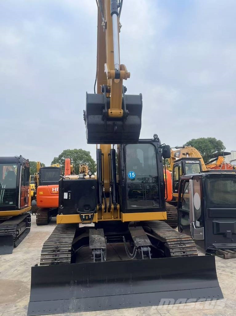 CAT 310 Гусеничні екскаватори