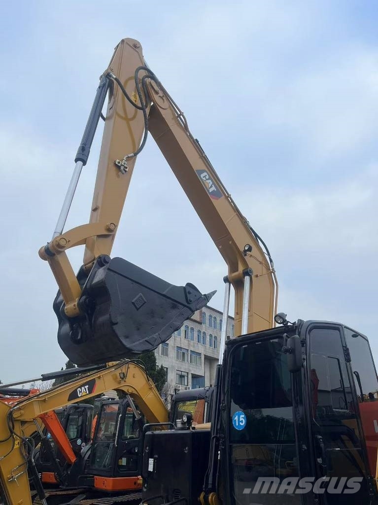 CAT 310 Гусеничні екскаватори