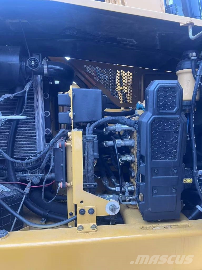 CAT 310 Гусеничні екскаватори