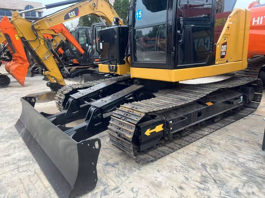 CAT 310 Гусеничні екскаватори