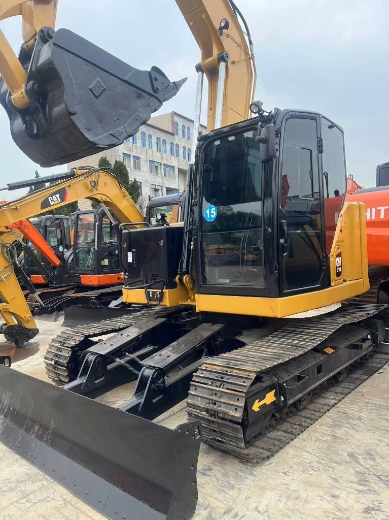 CAT 310 Гусеничні екскаватори