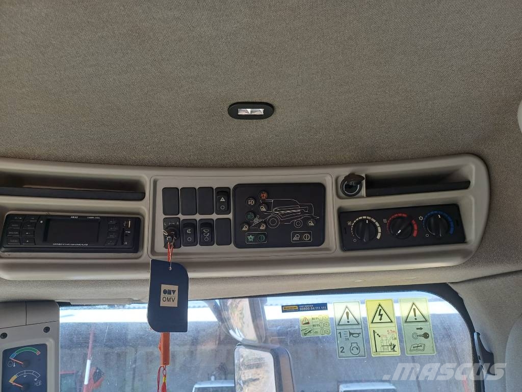 New Holland TC 5.90 Kombajni