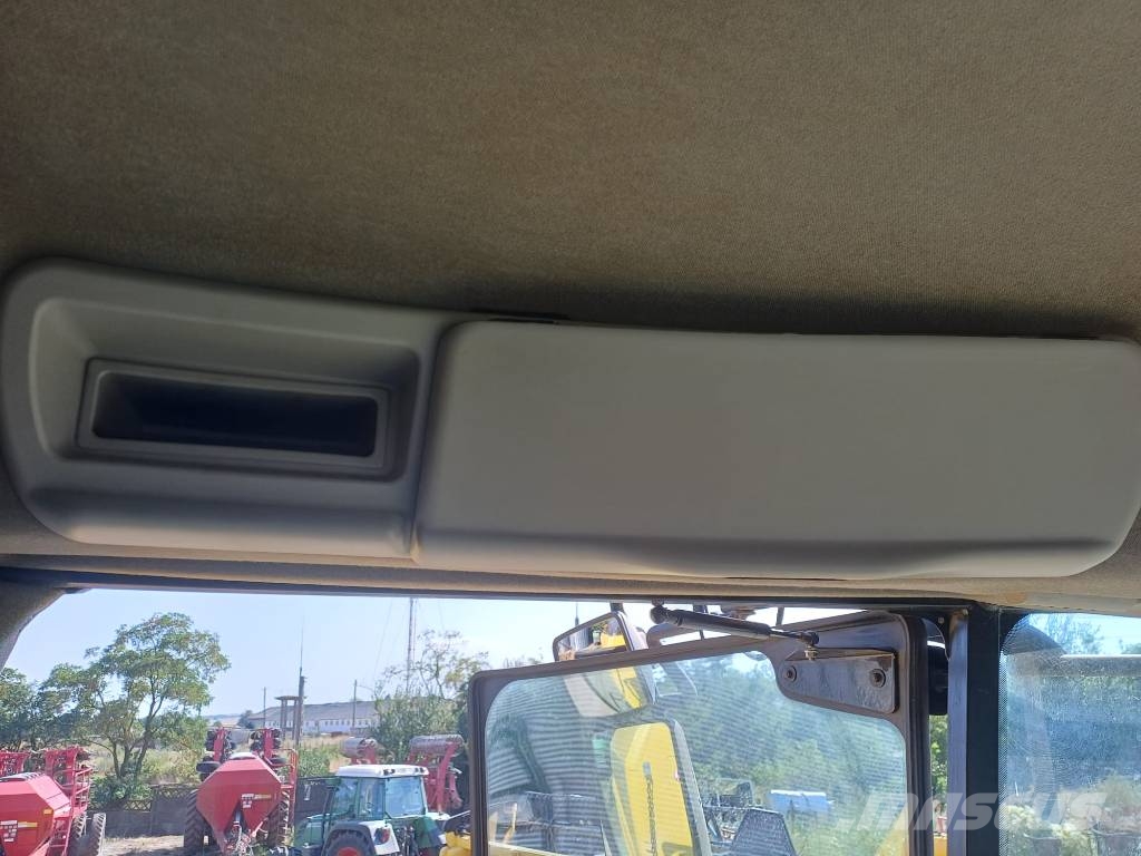 New Holland TC 5.90 Kombajni