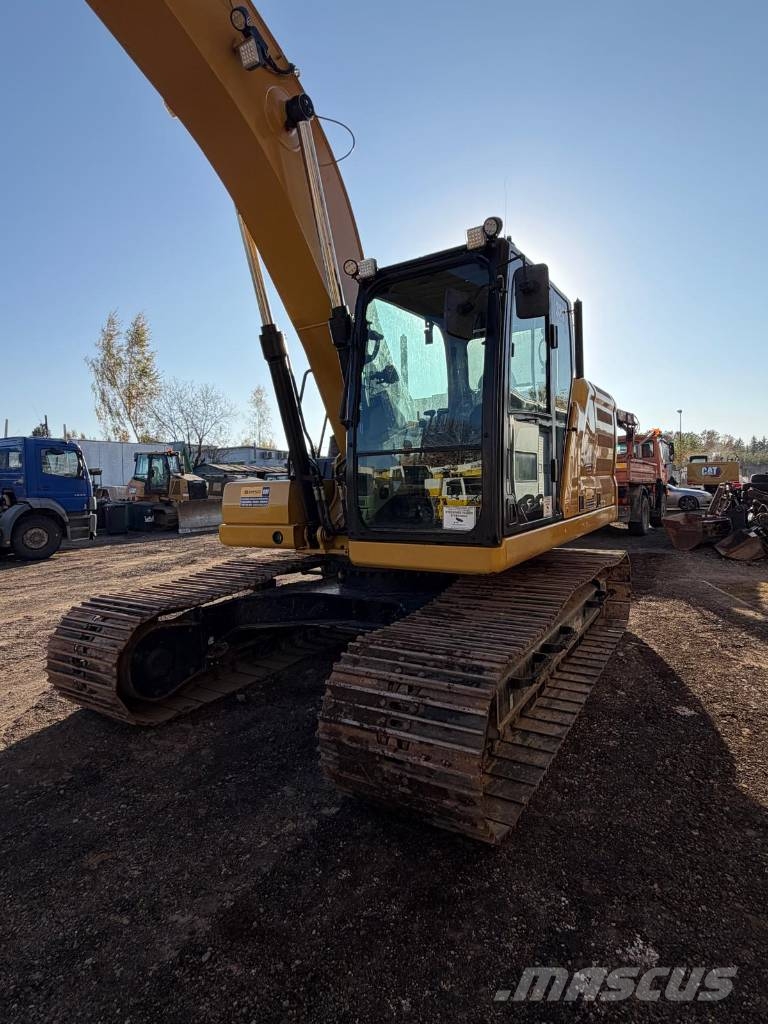 CAT 323 Beltegraver