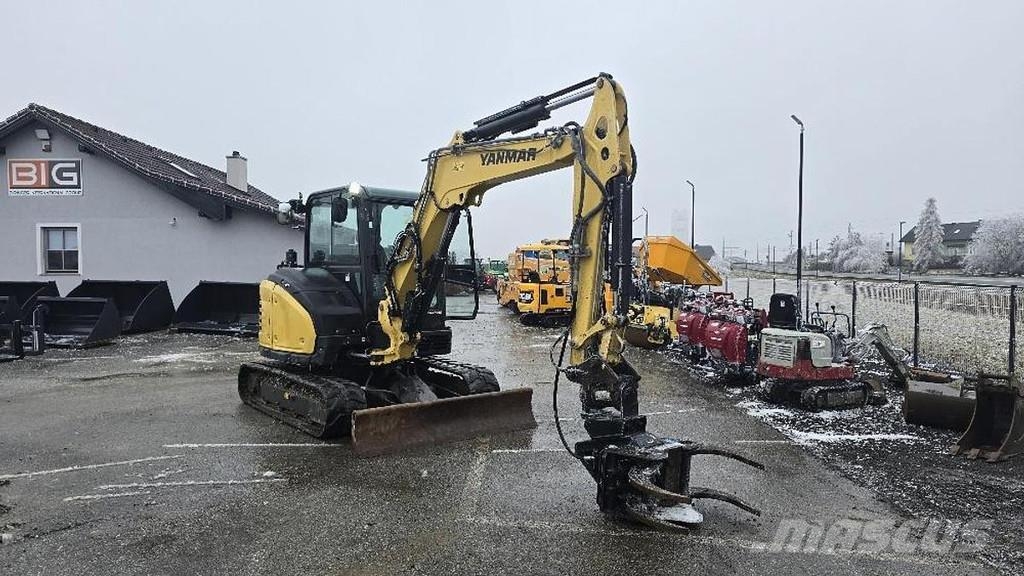Yanmar SV60-A Bagger mit JAK 250 Fällgreifer حفارات خاصة