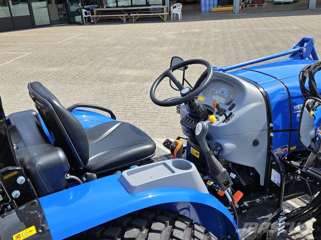 New Holland Boomer 55 HST met voorlader en Kemp balenprikker Kompakttraktorid