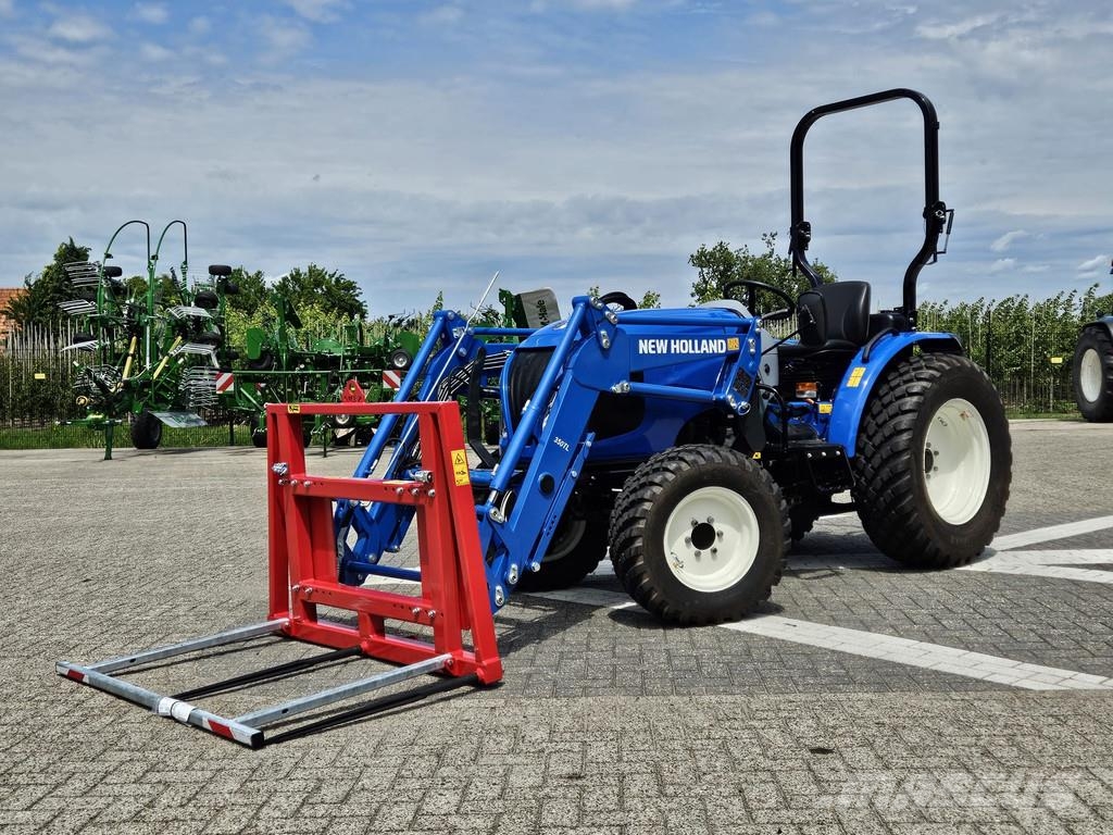 New Holland Boomer 55 HST met voorlader en Kemp balenprikker Kompakttraktorid