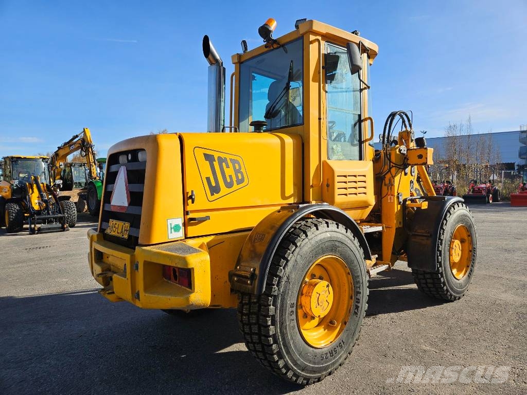 JCB 411 Iekrāvēji uz riteņiem