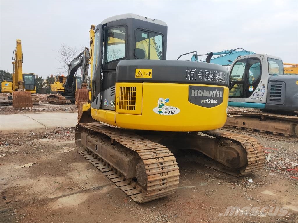 Komatsu PC 128 US حفارات وسط 7 طن - 12 طن