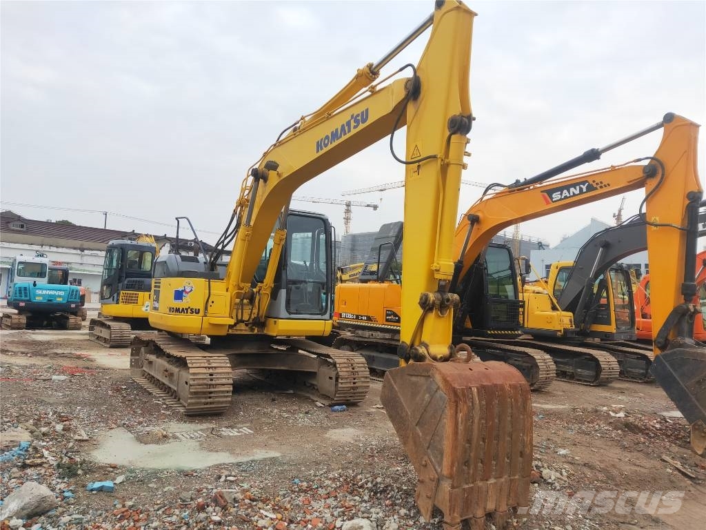 Komatsu PC 128 US حفارات وسط 7 طن - 12 طن