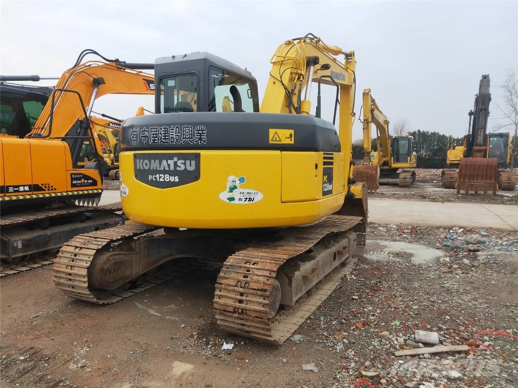 Komatsu PC 128 US حفارات وسط 7 طن - 12 طن