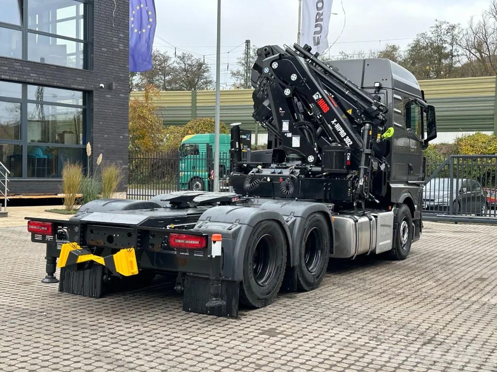 MAN TGX 33.580 MAN TGX 33.580 6x4 Kran Hiab 302-6 + Ji All-Terrain-Krane