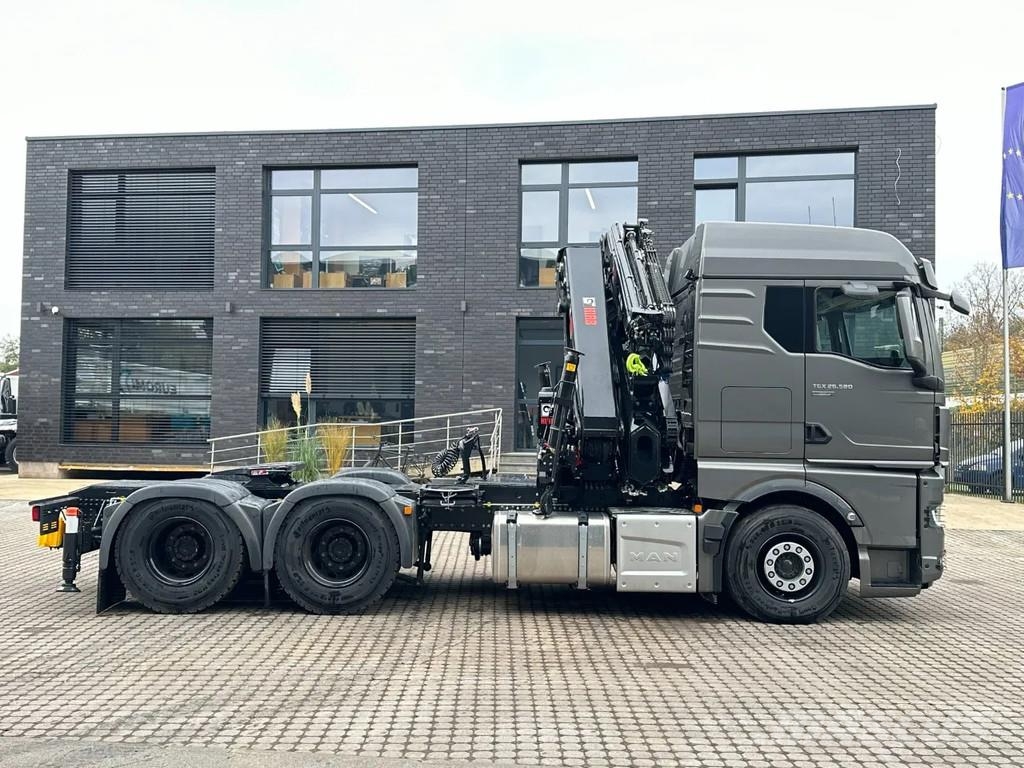 MAN TGX 33.580 MAN TGX 33.580 6x4 Kran Hiab 302-6 + Ji All-Terrain-Krane